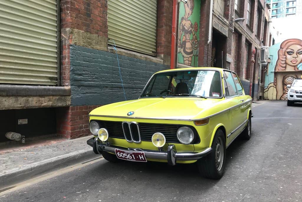 Lime green BMW in city street